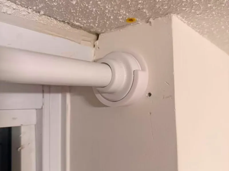 Curtain rod holder with screw holes