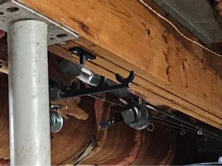 Fishing pole ceiling hanger