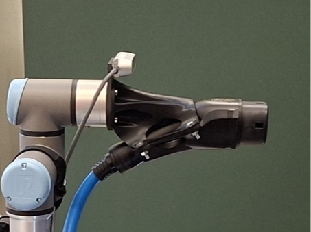 Robot arm charging cable holder