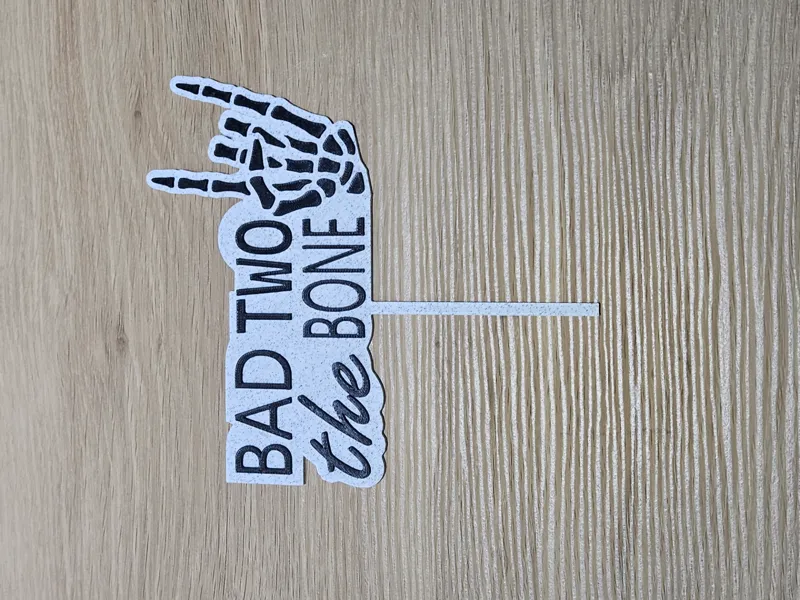 Bad two the bone cake topper