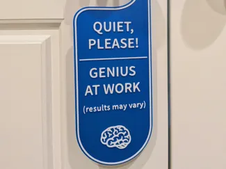 Quiet Please Genius At Work Door Hanger