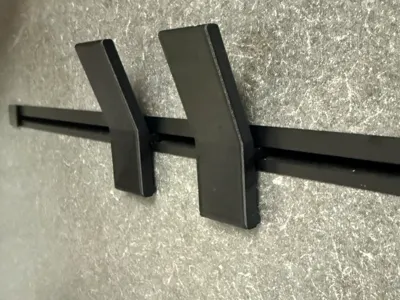 Wall hook suitable for Hymer multifunction rails