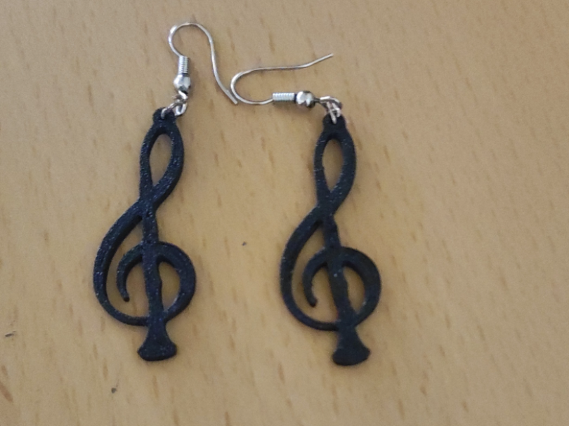 Pendientes de clave de sol con clarinete