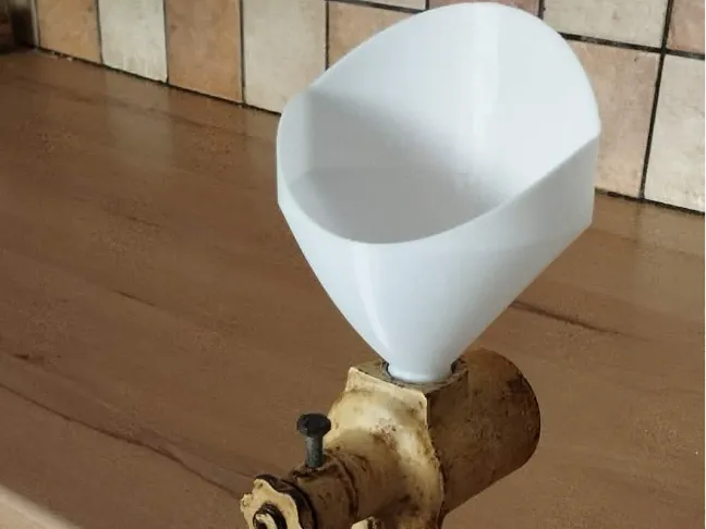 Funnel for poppy seed grinder