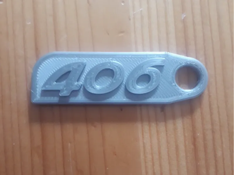 Porte clef logo Peugeot 406