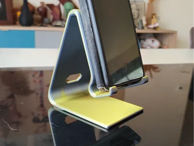 Smartphone holder with charging port