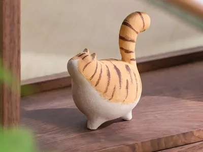 Wabi-sabi style faceless chubby orange cat