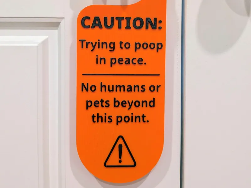Caution Trying To Poop In Peace Door Hanger