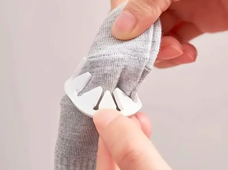 washing machine or dryer sock coupler