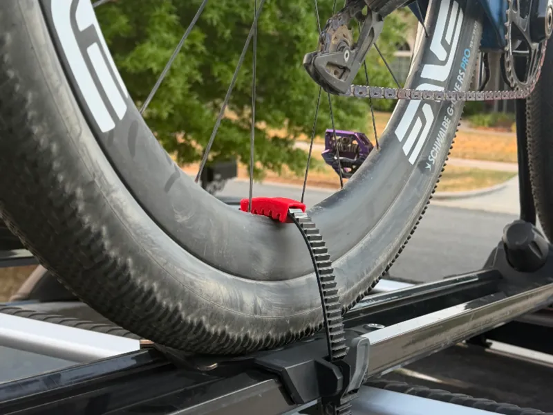 Bike rack ratchet strap wheel protector 