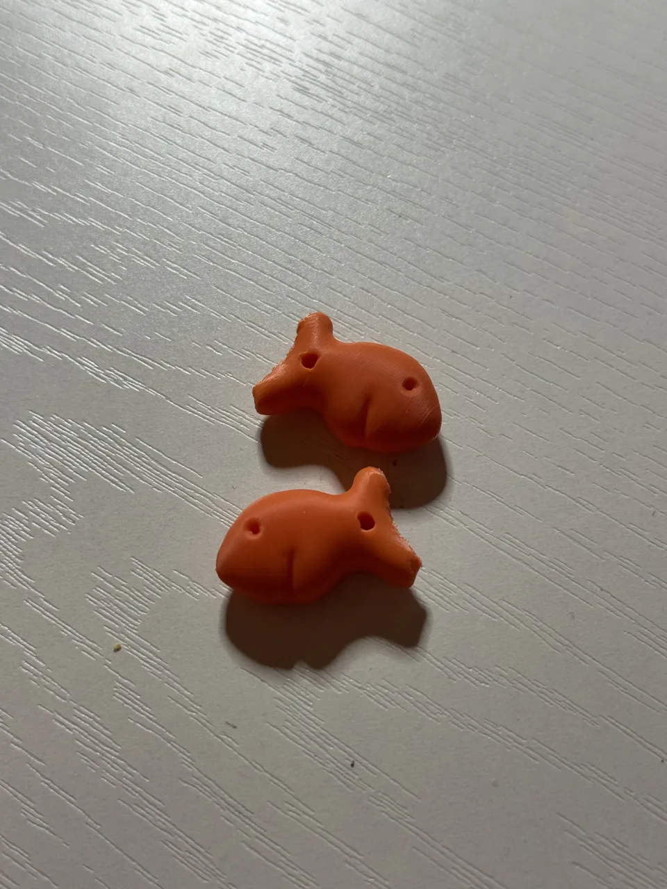 Fish cracker earrings view 2