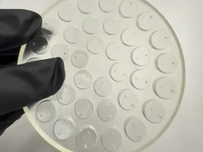 Acoustic levitator plate