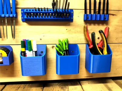 Wall-mounted tool organizer