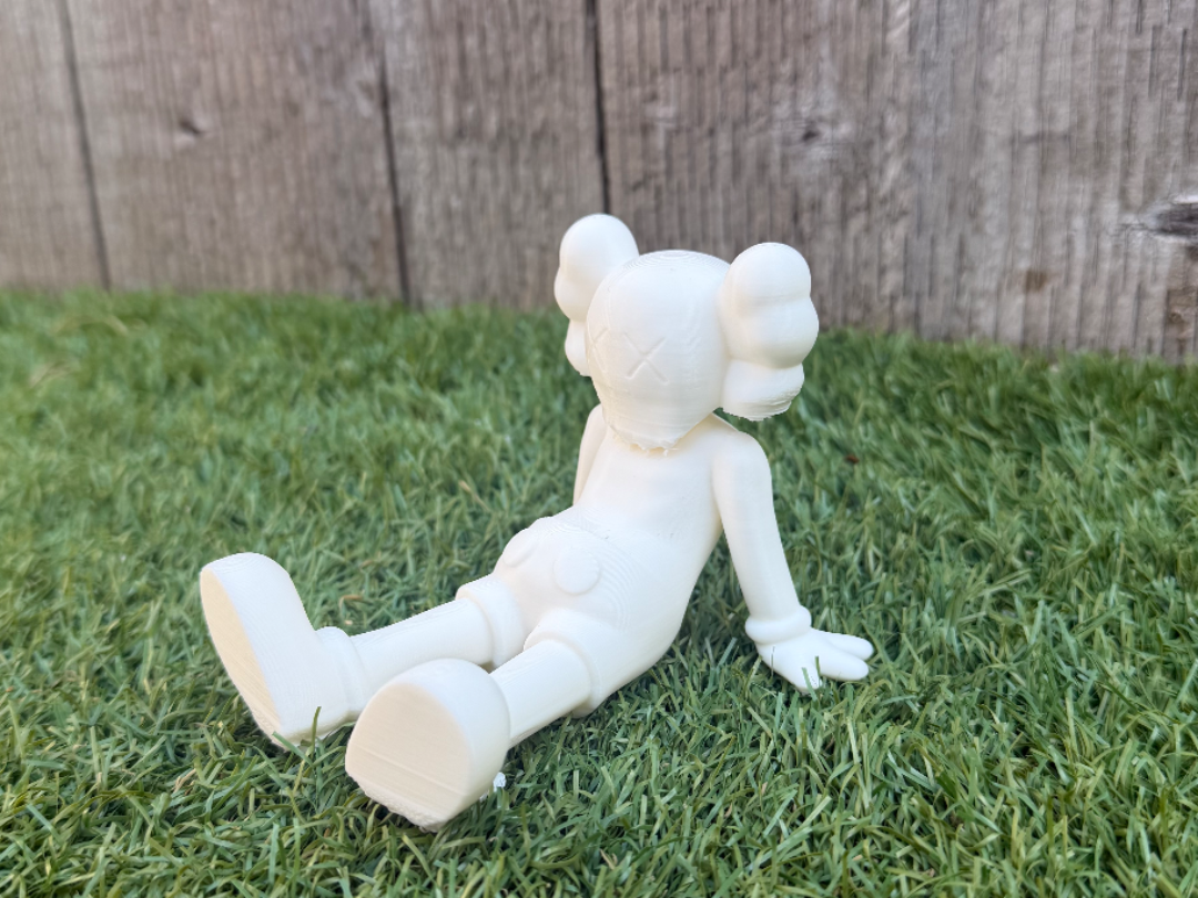 Sitting Kaws Companion