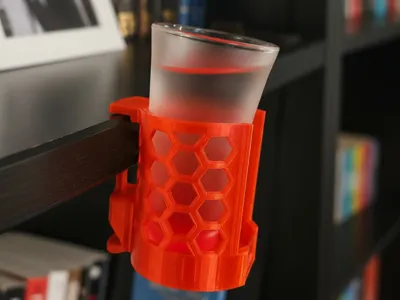 Slanted prank cup holder