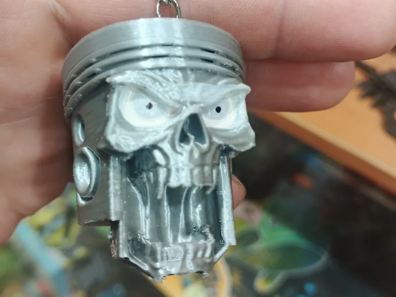 piston skull keychain