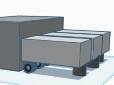 3 trailers in a warehouse 