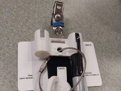 Pen holder for ID badge