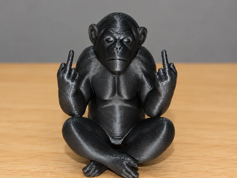 Chimpanzee sitting Giving the Double Middle Finger