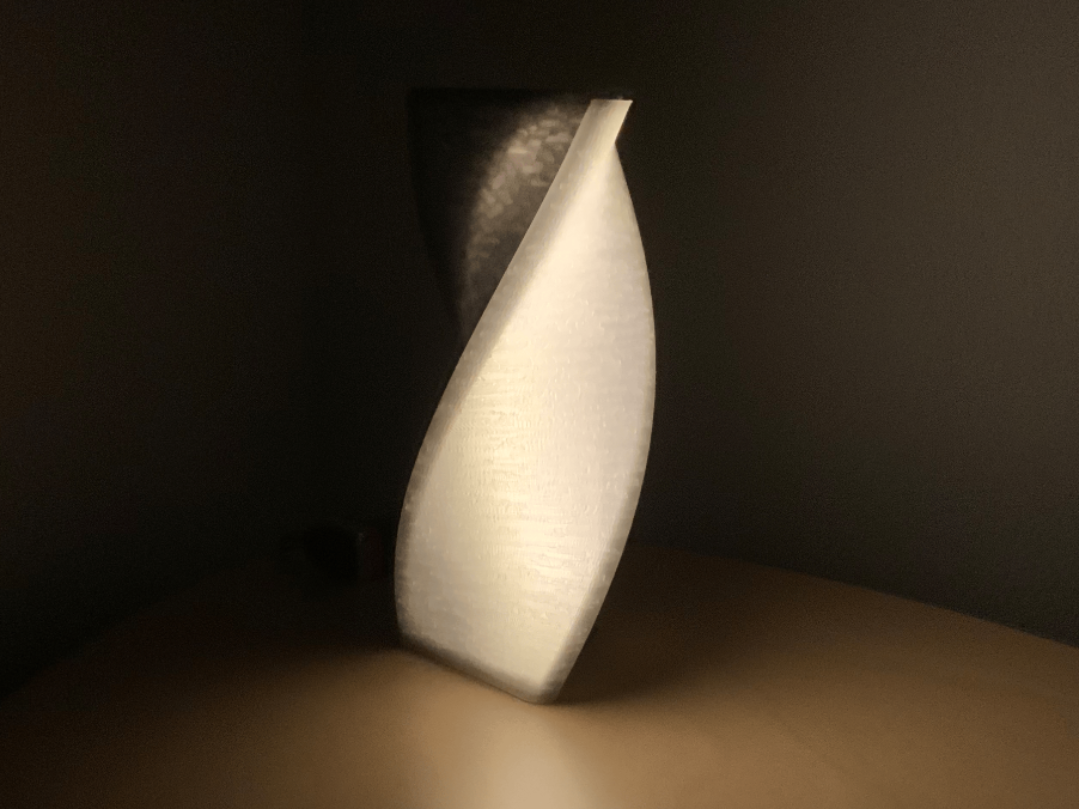 Triangular twisted lamp