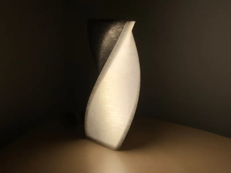 Triangular twisted lamp