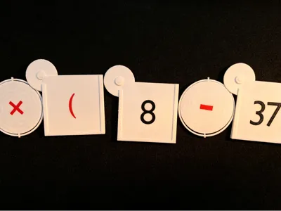 Math Teaching Aid: Physical Reinforcer for Arithmetic Operation Sign Change Awareness