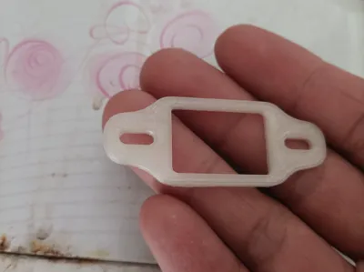 Repair shim for rice cooker power socket, used to replace broken mounting tabs on the socket, after installation, the socket can be firmly fixed back in place