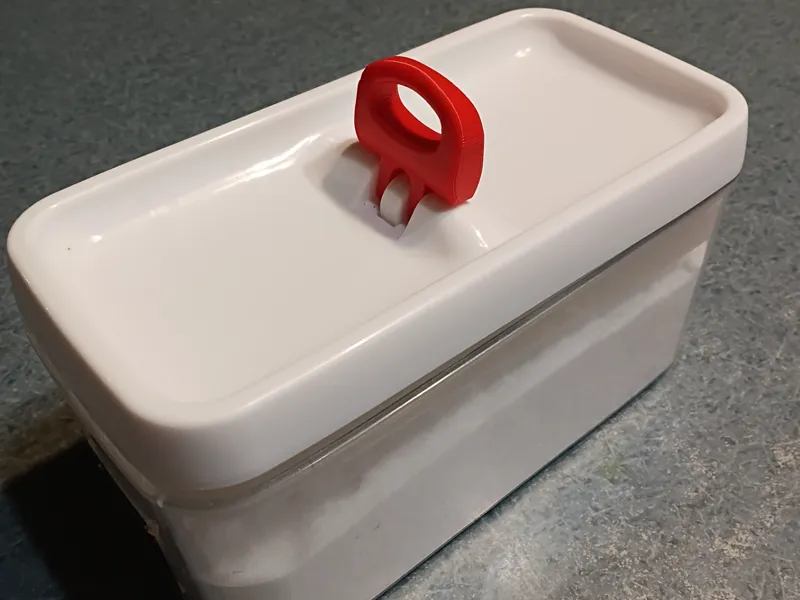 Cam lock clip for Kmart food container.