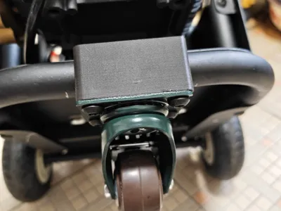 Adapter for non-destructively converting the footpad of the Yuntuo Bao TB-2 car wash machine to 2-inch swivel casters