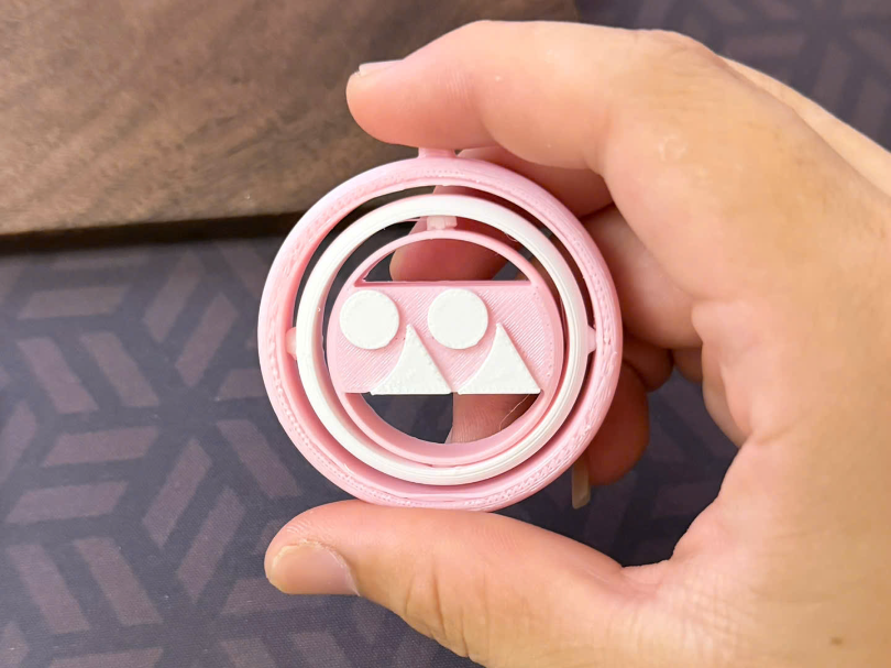 Yonex logo keychain with rotating ring