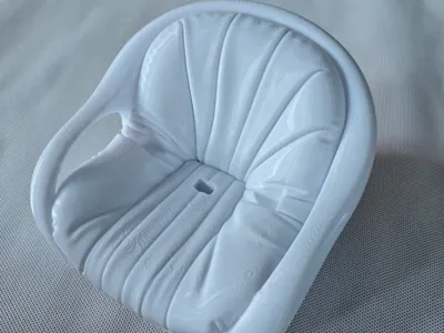 Curved sofa and chair style phone stand with charging cable access