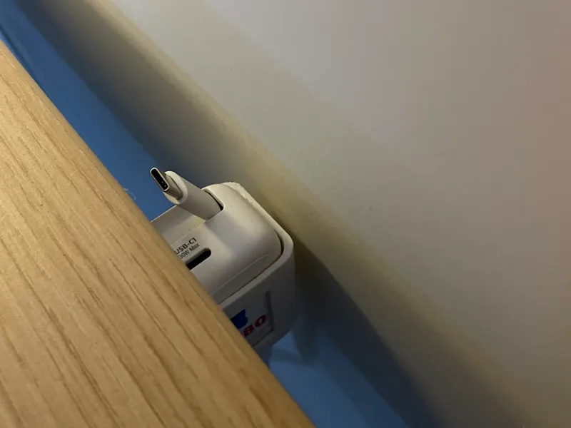 Retractable charger desk holder 