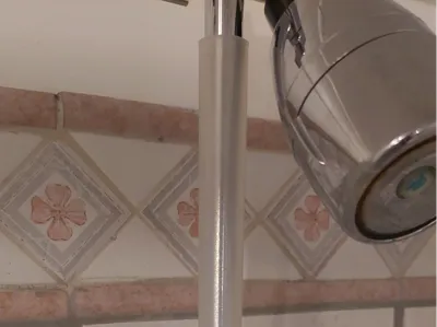 Shower arm insulator