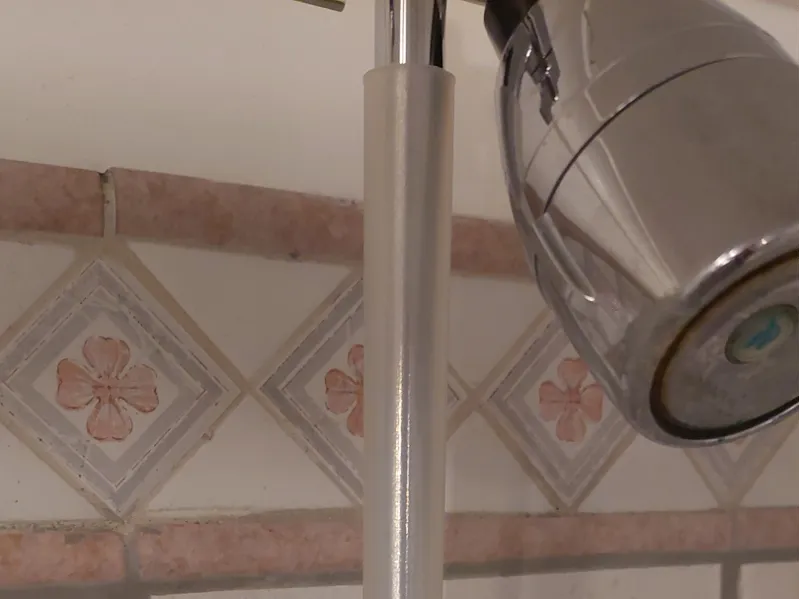 Shower arm insulator