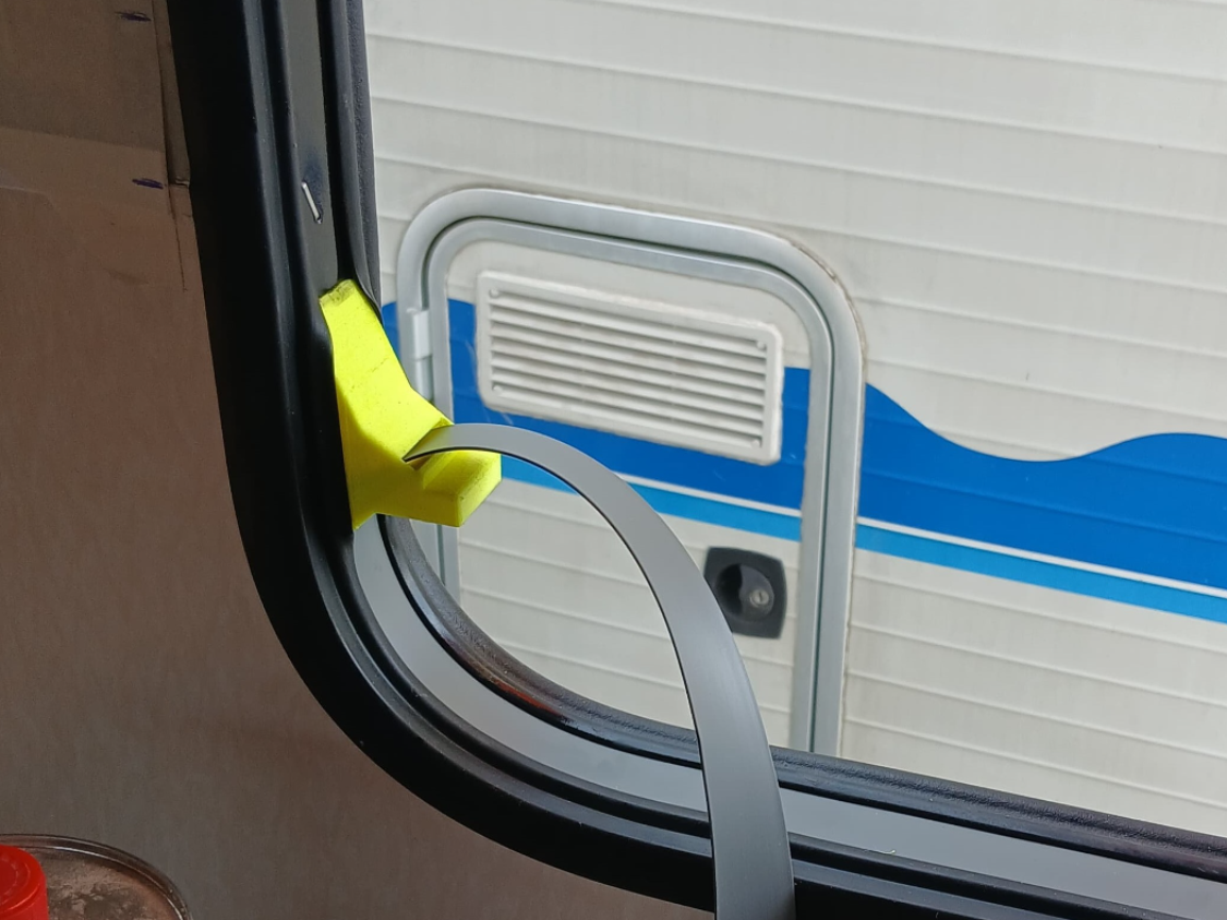 Camper window sealing tool