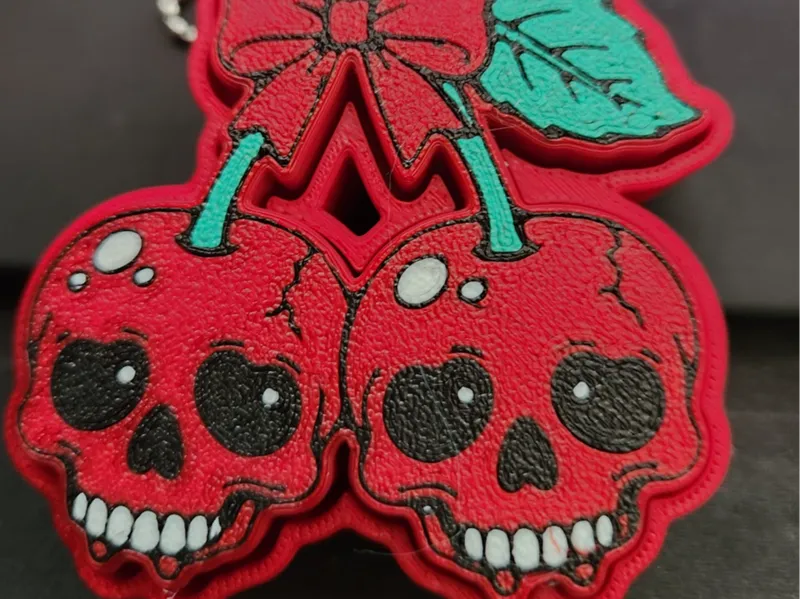 Cherry skulls clicker keychain/bag charm