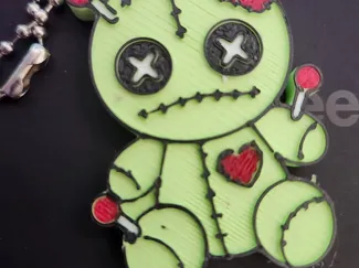 voodoo doll can tab opener keychain