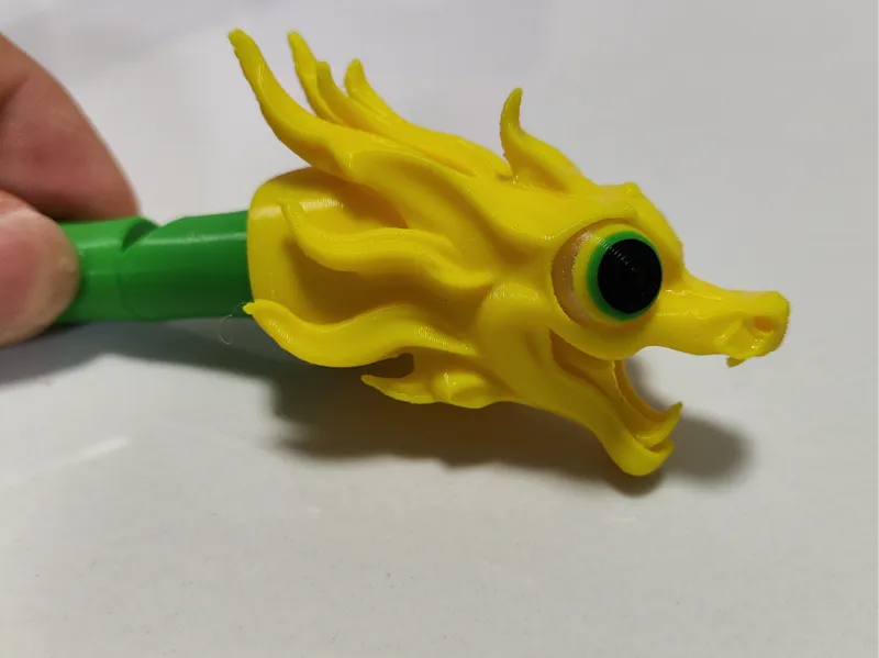 龙口哨旋转会动的大眼睛龙口哨卡扣版卷卷龙口哨玩具