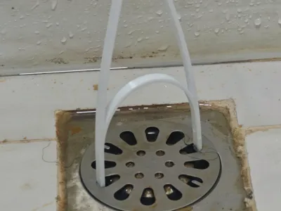 Handle for a Drain Cover
