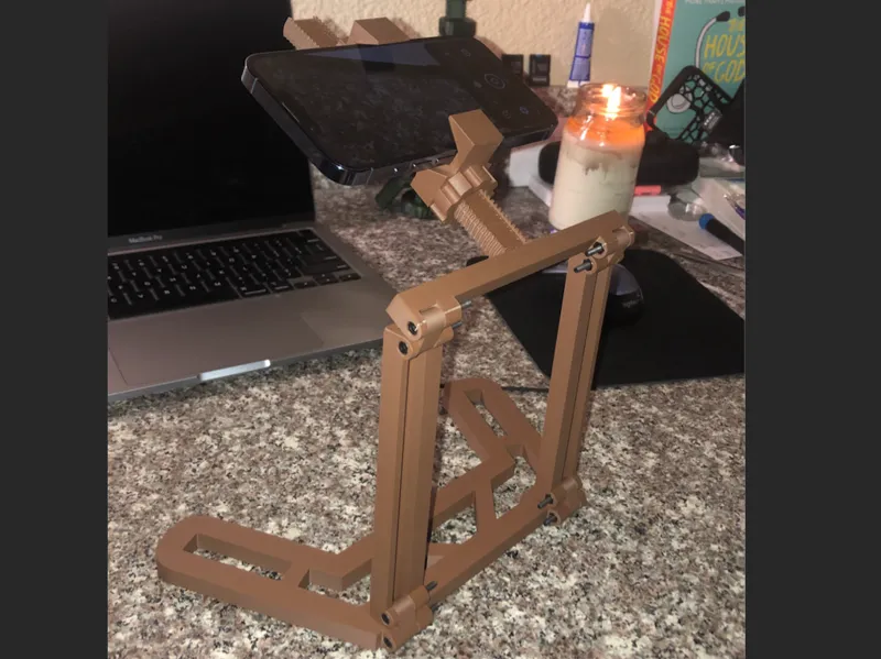 Folding smartphone magnification stand/station