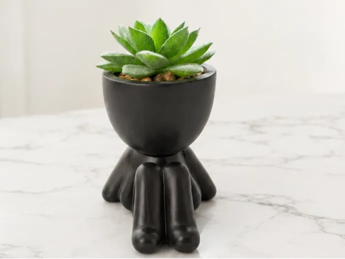 cute sitting planter 