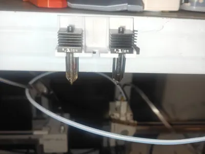Nozzle storage magnetic holder with customizable text