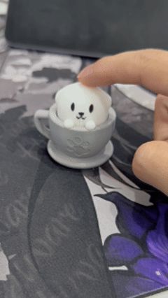 解压茶杯狗