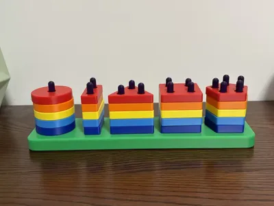 Geometric shapes (pegless), color recognition, shape recognition, educational toy