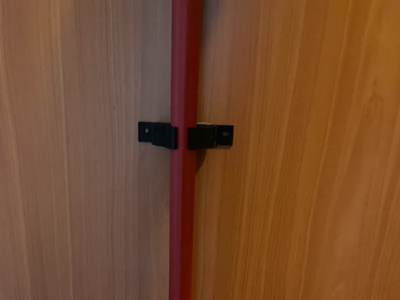 Wall-mounted broom holder