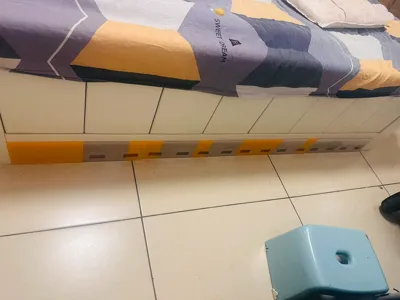 Under-bed stopper, blocks openings and gaps