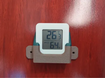 Wall-mounted temperature and humidity meter holder