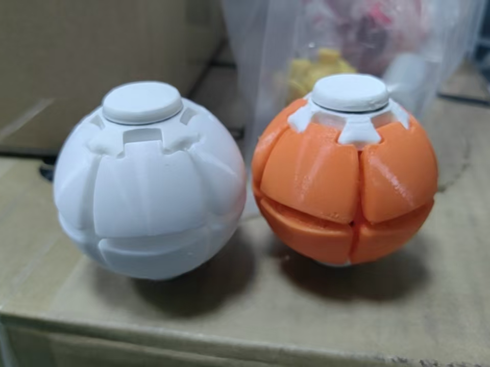 压钮球（使用柔性材料则无需橡皮筋）