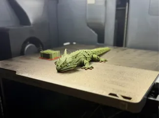 Articulated flexi lizard.