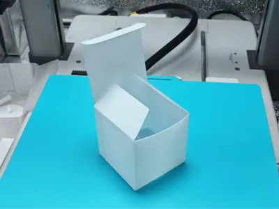 First layer test (you also get a 60mm small square box while testing)